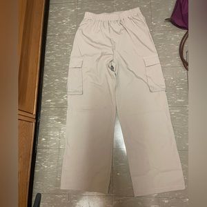 Light weight cargo/parachute pants never worn with elastic waistband
